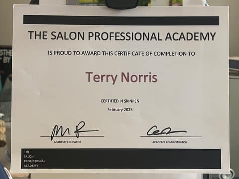 Certificate of completion from The Salon Professional Academy awarding Terry Norris certification in SkinPen microneedling, February 2023
