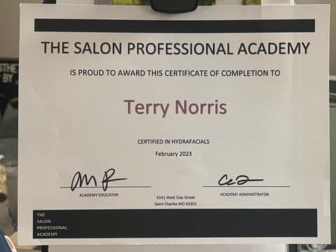 Certificate of completion from The Salon Professional Academy awarding Terry Norris certification in HydraFacials, February 2023